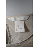 La garantie Once Again : 573922 vêtements d'occasion de marque en état irréprochable.