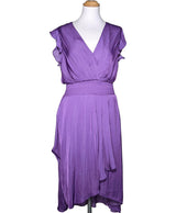 La garantie Once Again : 573990 vêtements d'occasion de marque en état irréprochable.