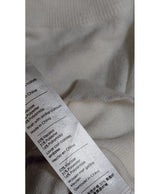 La garantie Once Again : 574187 vêtements d'occasion de marque en état irréprochable.