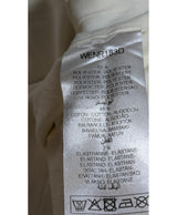 La garantie Once Again : 574260 vêtements d'occasion de marque en état irréprochable.
