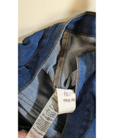 La garantie Once Again : 574342 vêtements d'occasion de marque en état irréprochable.