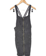 La garantie Once Again : 574476 vêtements d'occasion de marque en état irréprochable.