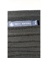 La garantie Once Again : 574495 vêtements d'occasion de marque en état irréprochable.