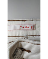 La garantie Once Again : 574526 vêtements d'occasion de marque en état irréprochable.