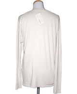 La garantie Once Again : 574612 vêtements d'occasion de marque en état irréprochable.