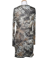 La garantie Once Again : 574616 vêtements d'occasion de marque en état irréprochable.