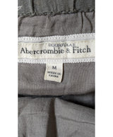 La garantie Once Again : 574628 vêtements d'occasion de marque en état irréprochable.