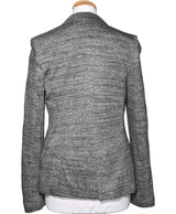 La garantie Once Again : 574864 vêtements d'occasion de marque en état irréprochable.