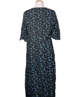La garantie Once Again : 574988 vêtements d'occasion de marque en état irréprochable.