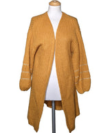 La garantie Once Again : 575034 vêtements d'occasion de marque en état irréprochable.