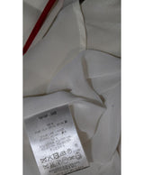 La garantie Once Again : 575066 vêtements d'occasion de marque en état irréprochable.
