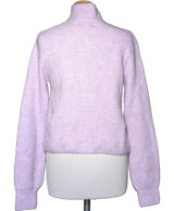 La garantie Once Again : 575101 vêtements d'occasion de marque en état irréprochable.