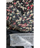 La garantie Once Again : 575123 vêtements d'occasion de marque en état irréprochable.
