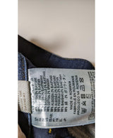 La garantie Once Again : 575155 vêtements d'occasion de marque en état irréprochable.