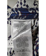 La garantie Once Again : 575182 vêtements d'occasion de marque en état irréprochable.