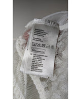 La garantie Once Again : 575206 vêtements d'occasion de marque en état irréprochable.