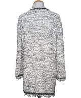 La garantie Once Again : 575819 vêtements d'occasion de marque en état irréprochable.