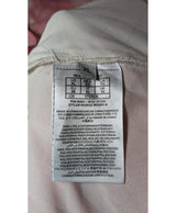 La garantie Once Again : 575848 vêtements d'occasion de marque en état irréprochable.