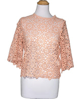 La garantie Once Again : 575858 vêtements d'occasion de marque en état irréprochable.