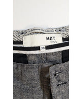 La garantie Once Again : 576355 vêtements d'occasion de marque en état irréprochable.
