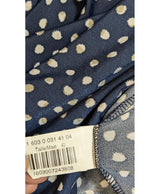 La garantie Once Again : 576439 vêtements d'occasion de marque en état irréprochable.
