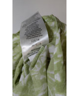 La garantie Once Again : 576532 vêtements d'occasion de marque en état irréprochable.