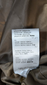 La garantie Once Again : 576640 vêtements d'occasion de marque en état irréprochable.