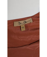 577043 Once Again, la référence de la friperie en ligne pour des achats de vêtements d'occasion sans souci et en état parfait.