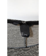 La garantie Once Again : 577248 vêtements d'occasion de marque en état irréprochable.