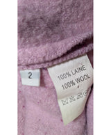 La garantie Once Again : 577522 vêtements d'occasion de marque en état irréprochable.