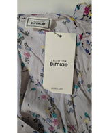 La garantie Once Again : 577644 vêtements d'occasion de marque en état irréprochable.