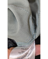 Élégance responsable avec cette pièce vintage 577865 en parfait état, sélectionnée par Once Again.