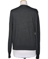 La garantie Once Again : 578375 vêtements d'occasion de marque en état irréprochable.