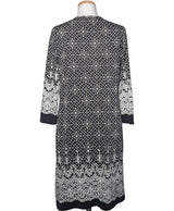 La garantie Once Again : 578417 vêtements d'occasion de marque en état irréprochable.