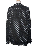 La garantie Once Again : 578484 vêtements d'occasion de marque en état irréprochable.