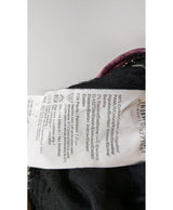 La garantie Once Again : 578635 vêtements d'occasion de marque en état irréprochable.
