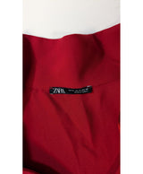 La garantie Once Again : 578838 vêtements d'occasion de marque en état irréprochable.