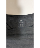 La garantie Once Again : 578878 vêtements d'occasion de marque en état irréprochable.
