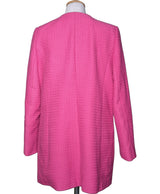 La garantie Once Again : 578944 vêtements d'occasion de marque en état irréprochable.