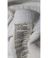 La garantie Once Again : 579131 vêtements d'occasion de marque en état irréprochable.