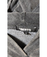 La garantie Once Again : 579272 vêtements d'occasion de marque en état irréprochable.