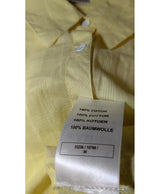 La garantie Once Again : 579274 vêtements d'occasion de marque en état irréprochable.