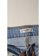 La garantie Once Again : 579644 vêtements d'occasion de marque en état irréprochable.