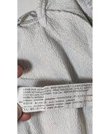 La garantie Once Again : 579669 vêtements d'occasion de marque en état irréprochable.