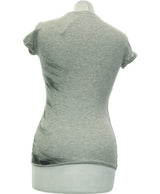 140940 Tops et t-shirts GUESS Occasion Vêtement occasion seconde main