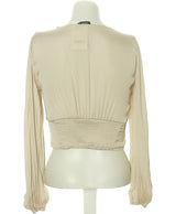 189574 Tops et t-shirts STRADIVARIUS Occasion Vêtement occasion seconde main