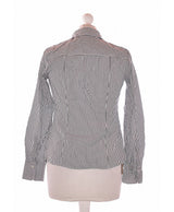 213066 Chemises et blouses MANGO Occasion Vêtement occasion seconde main