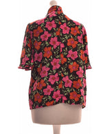 263768 Tops et t-shirts MANGO Occasion Vêtement occasion seconde main