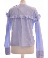 273504 Tops et t-shirts MANGO Occasion Vêtement occasion seconde main