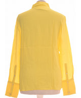 310899 Chemises et blouses MANGO Occasion Vêtement occasion seconde main